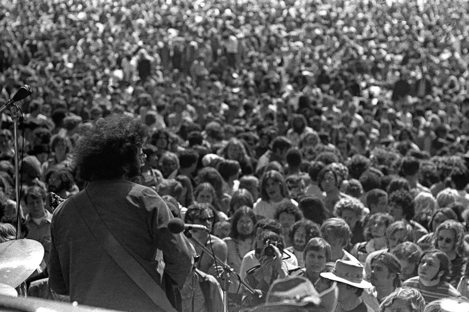 Jerry Garcia of the Grateful Dead plays live in front of a large Polo Field crowd on May 7, 1969, at Golden Gate Park in San Francisco.