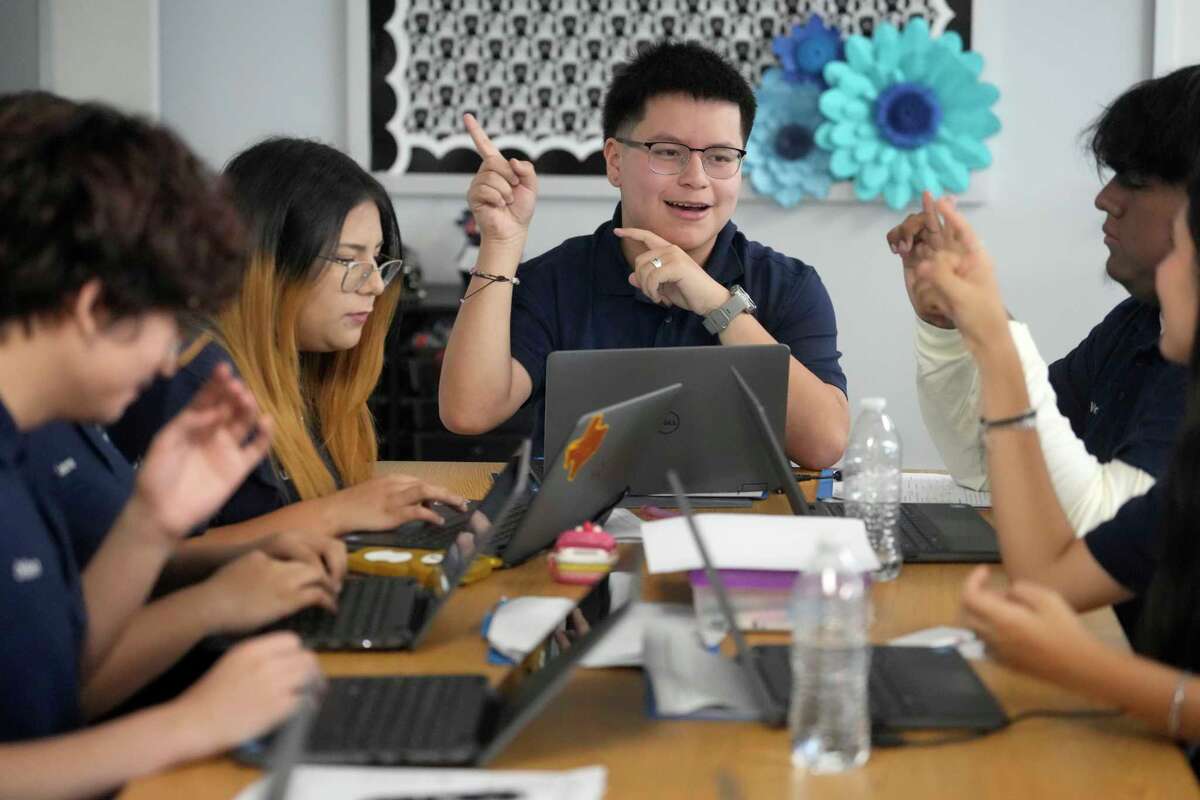 Andres Aguinaga, 17, center, and others students are shown during the Impact Bootcamp at YES Prep Northline Secondary in Houston Thursday, July 31, 2025. A new University of Houston report shows that many Houston ISD students are enrolling into YES Prep and KIPP charter systems after exiting the district under state-appointed leadership.