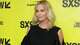 Actress Charlize Theron walks the red carpet for the premiere of the film "Atomic Blonde" during the South by Southwest Film Conference held at the Paramount Theater on March 12, 2017 in Austin, Texas. SUZANNE CORDEIRO/AFP