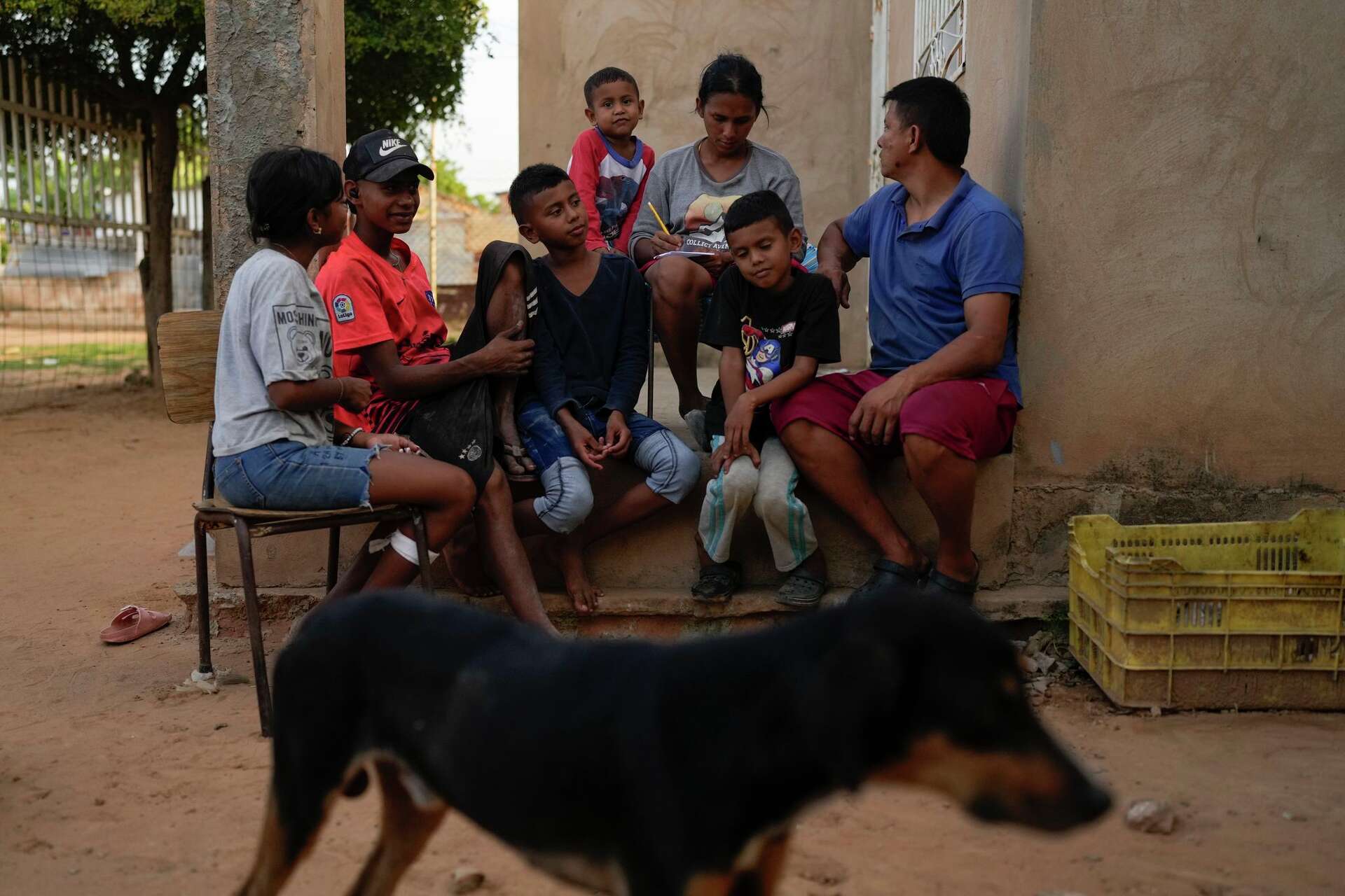 Migrants returning to Venezuela face debt and harsh living conditions