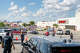 Investigators and law enforcement search the grounds of a Target store on August 11, 2025 in Austin, Texas. 3 people have died after a gunman opened fire in the parking lot of a Target store in north Austin. The suspect has been arrested after being detained by police in south Austin.