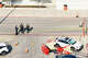 In an aerial view, law enforcement officers stand guard on the grounds of a Target store on August 11, 2025 in Austin, Texas. 3 people have died after a gunman opened fire in the parking lot of a Target store in north Austin. The suspect has been arrested (Photo by Brandon Bell/Getty Images)