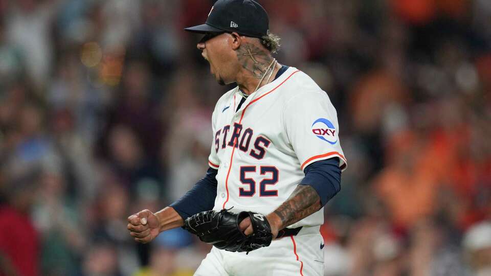 Houston Astros pitcher Bryan Abreu (52) reacts after striking out Boston Red Sox Rob Refsnyder for the final out of the ninth inning of an MLB baseball game in Houston, Wednesday, Aug. 13, 2025.