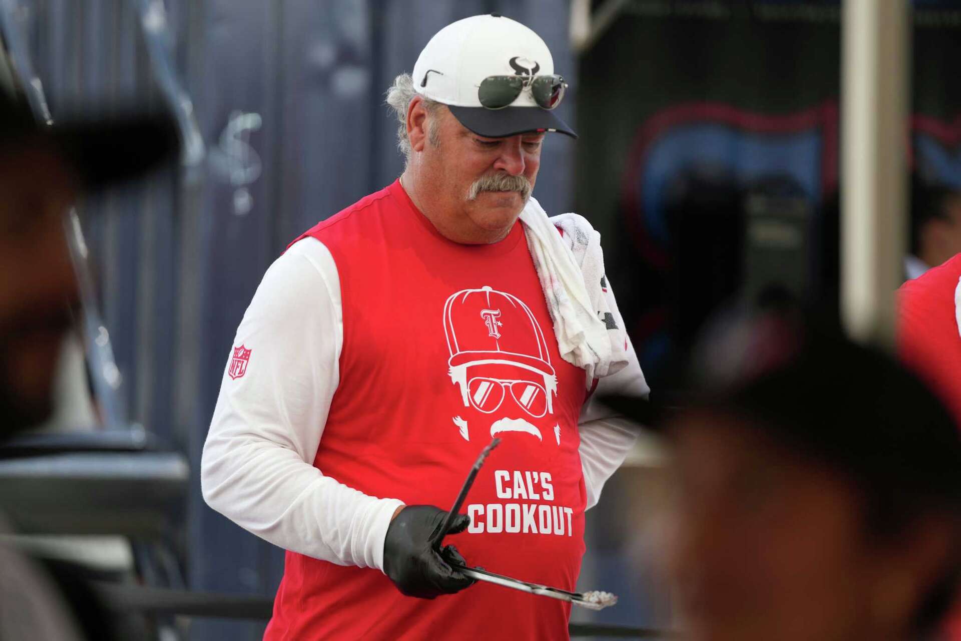 Houston Texans owner Cal McNair mans the grill for 'Cal's Cookout'
