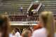 A Texas Longhorns fan holds up the sign of the horns during the game against Utah at Gregory Gymnasium on Friday, Aug. 15, 2025 in Austin, Texas.