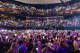 Fans lift their phone flashlights into the air as Wade Bowen performs "A Beautiful World" at the "Band Together Texas" flood benefit concert at Moody Center on Sunday, August 17.