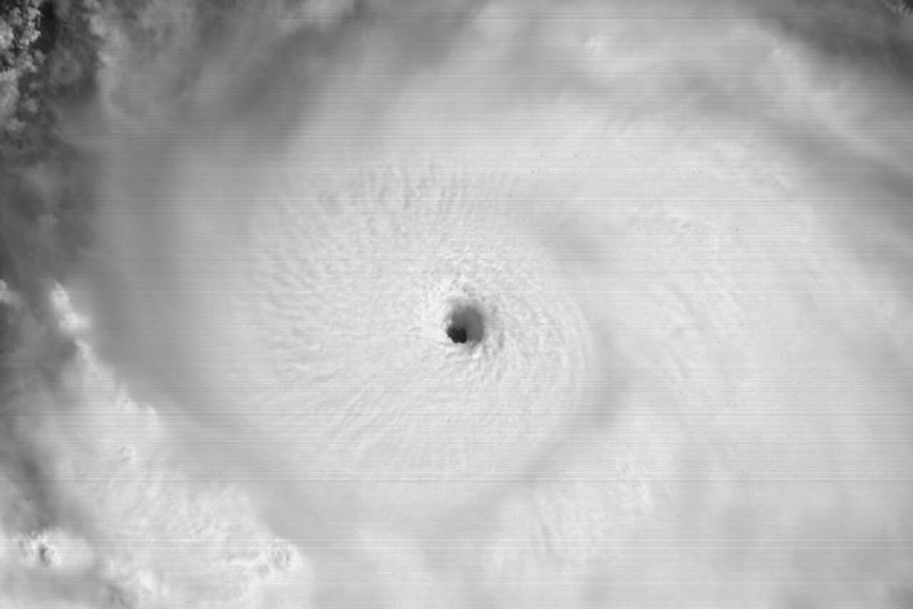 In this weather satellite image captured over the weekend on Aug. 16, the eye of Hurricane Erin is clearly defined as the storm strengthened into a Category 5 hurricane with maximum sustained winds of 160 mph north of the Leeward Islands in the western Atlantic Ocean. Erin is the first named storm of this year to become a hurricane.