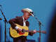 Lyle Lovett performs at the "Band Together Texas" flood benefit concert at Moody Center on Sunday, August 17.