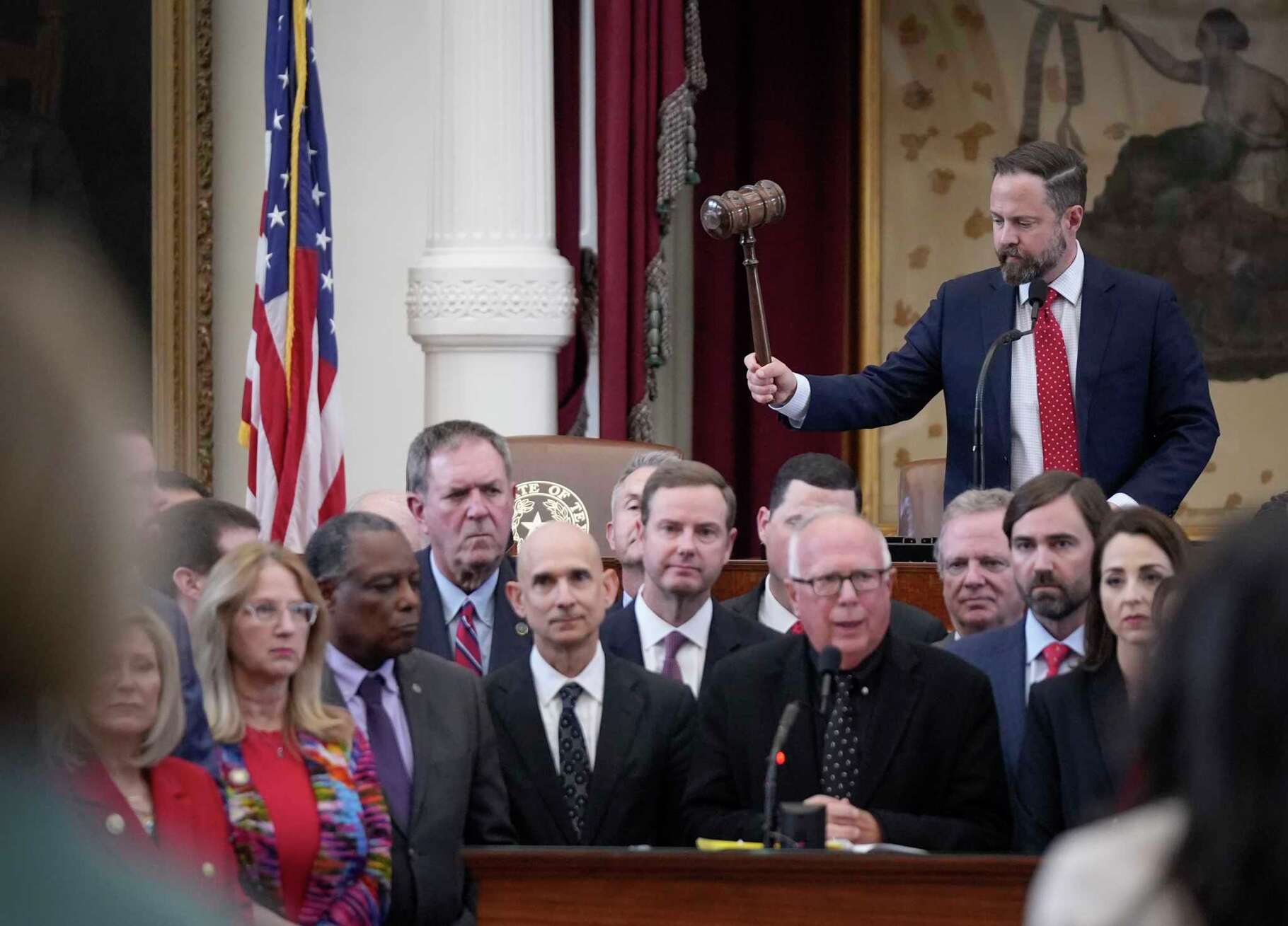 House Speaker Dustin Burrows tries to keep order as Rep. Todd Hunter, R-Corpus Christi, speaks in favor of a congressional redistricting plan at the Capitol in Austin, Wednesday, Aug. 20, 2025.