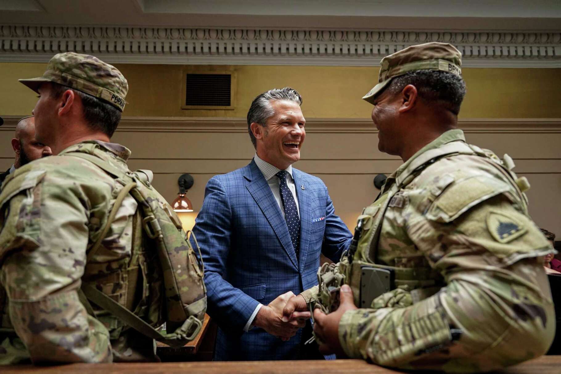 Defense Secretary Pete Hegseth meet with members of the National Guard at Union Station in Washington, Wednesday, Aug. 20, 2025. (Alexander Drago/Pool via AP)