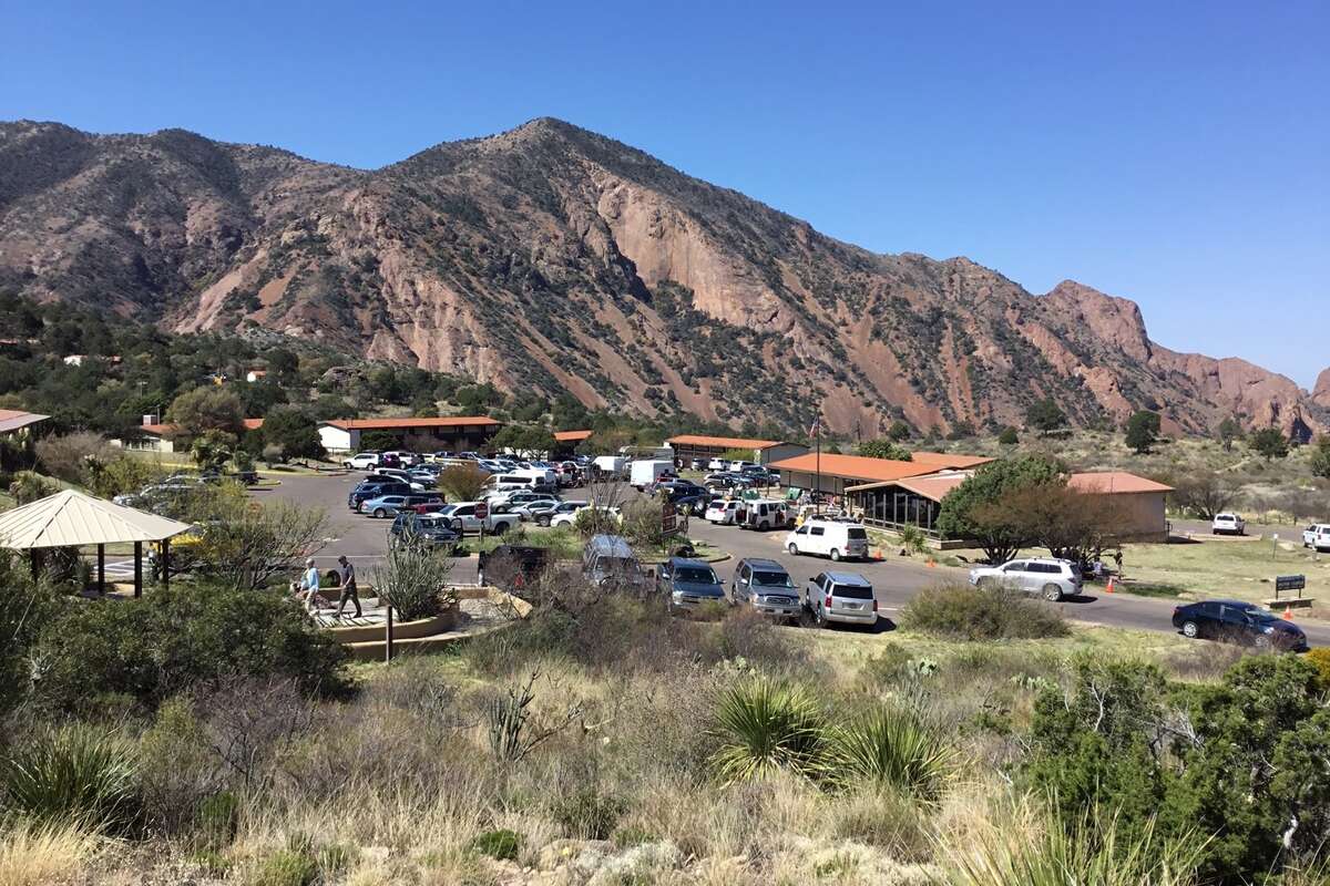 The Chisos Basin is a focal point for park visitors. The lodge, visitor center, store, and trailhead is located around the parking area.