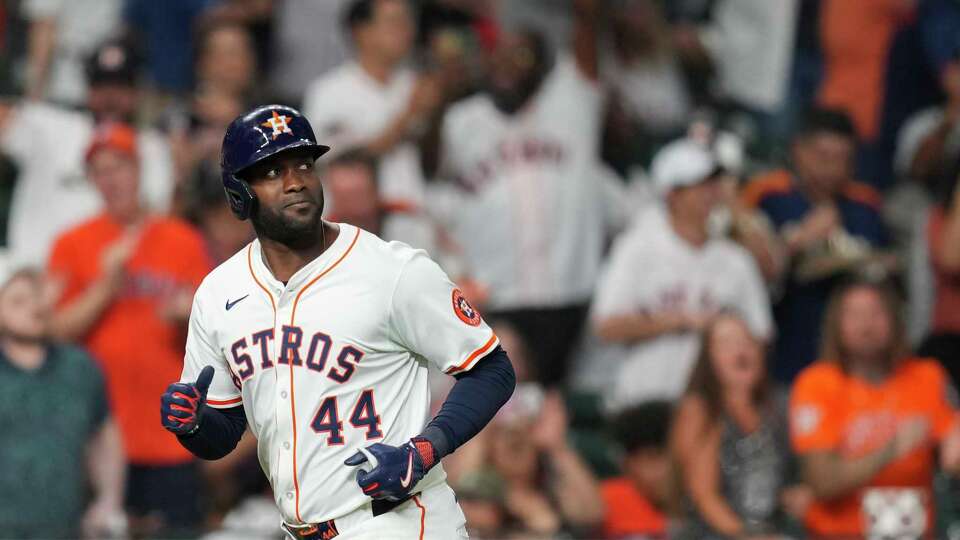 Houston Astros Yordan Alvarez (44) reacts after hitting a two-run home run during the eighth inning of an MLB baseball game in Houston, Wednesday, Aug. 27, 2025.
