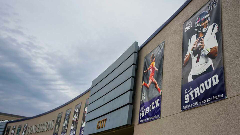 A banner featuring Houston Texans quarterback C.J. Stroud’ hangs in the Rancho Cucamonga High school stadium in Rancho Cucamonga, Calif., Thursday, Aug. 28, 2025.