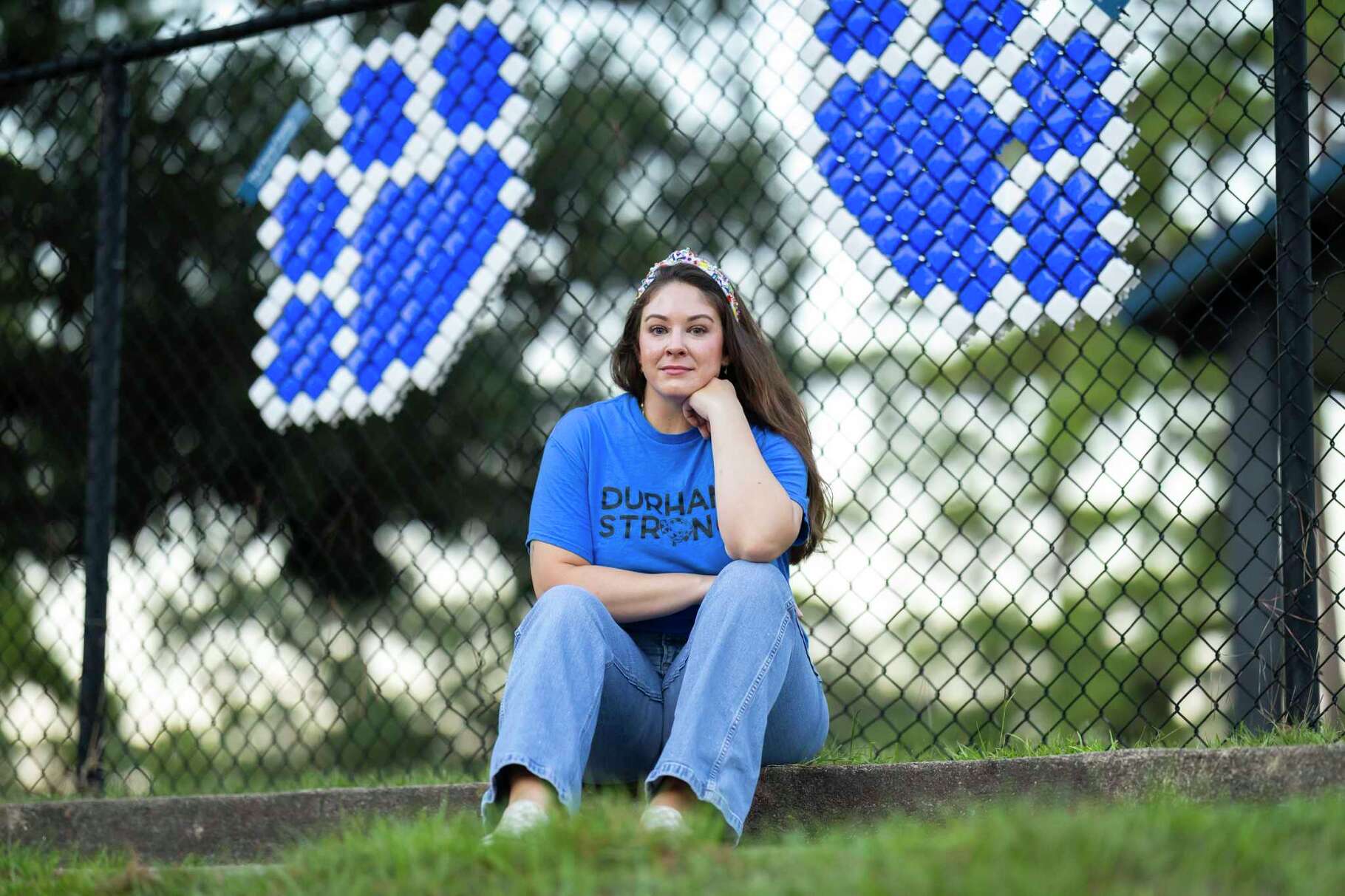 Angela Zuccarini Kelly poses with former students outside of Durham Elementary School on Wednesday, Sept. 03, 2025, in Houston.