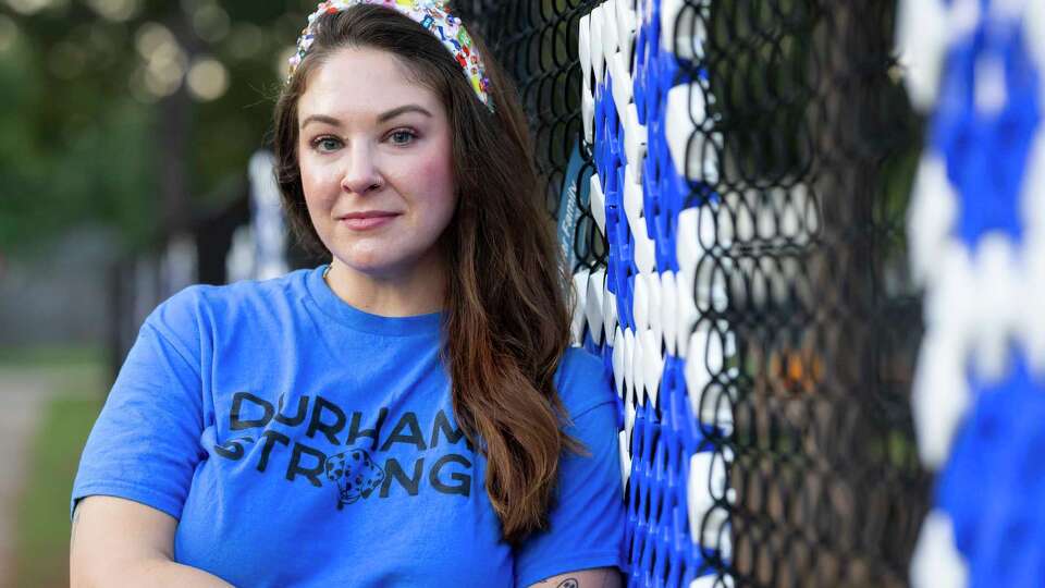 Angela Zuccarini Kelly poses with former students outside of Durham Elementary School on Wednesday, Sept. 03, 2025, in Houston.