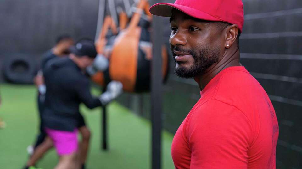 Boxing coach Mark Owens observes as clients participate in a conditioning drill in Houston, Thursday, Sept. 4, 2025.