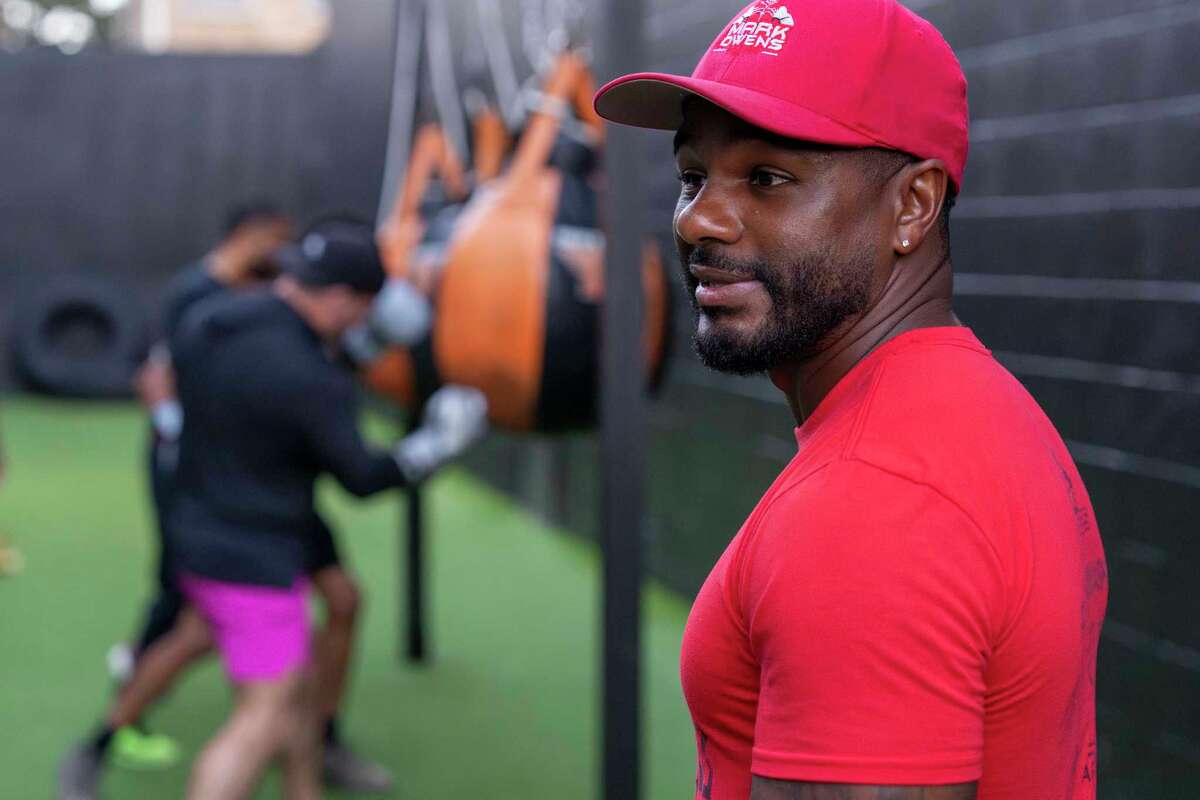 Boxing coach Mark Owens observes as clients participate in a conditioning drill in Houston, Thursday, Sept. 4, 2025.