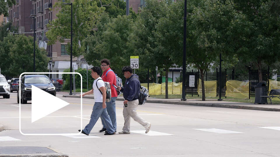 Lamar High School students cross Westheimer Road on Thursday August 28, 2025. A Lamar High School student was hit and injured by an SUV while crossing Westheimer Road on August 20, 2025