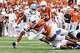 Texas Longhorns running back CJ Baxter (4) dives for a first down during the game against San José State at Darrell K Royal–Texas Memorial Stadium on Saturday, Sept. 6, 2025.