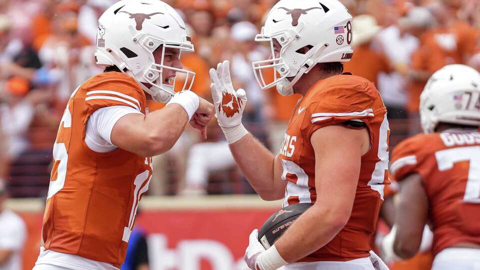 Texas Longhorns quarterback Arch Manning (16) celebrates a touchdown pass to tight end Jack Endries (88) during the game at Darrell K Royal–Texas Memorial Stadium on Saturday, Sept. 6, 2025.