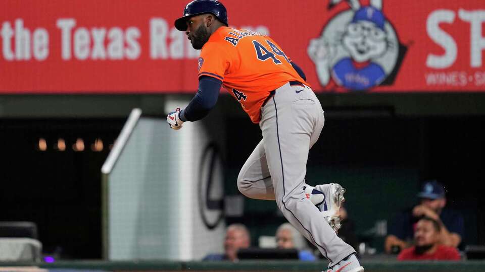Houston Astros' Yordan Alvarez sprints out of the batters box after hitting a run-scoring single in the eighth inning of a baseball game Saturday, Sept. 6, 2025, in Arlington, Texas. (AP Photo/Tony Gutierrez)