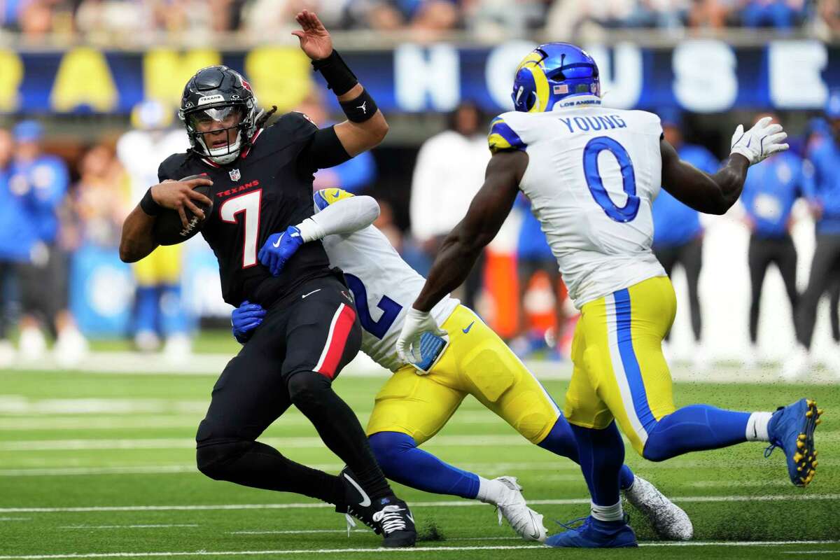 Houston Texans quarterback C.J. Stroud (7) is sacked by Los Angeles Rams safety Jaylen McCollough (2) for a 12-yard loss during the first half of an NFL football game at SoFi Stadium in Inglewood, Calif., Sunday, Sept. 7, 2025.