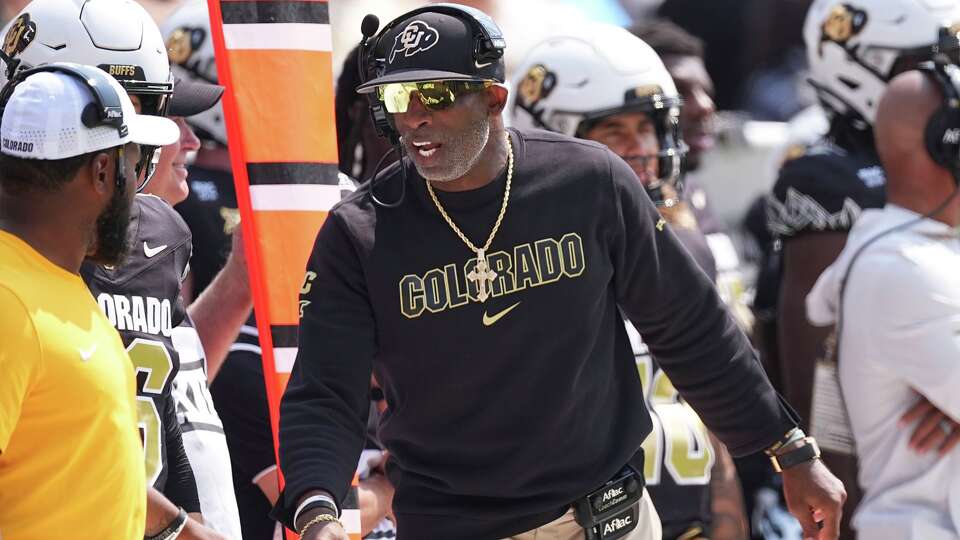 Colorado head coach Deion Sanders directs players in the first half of an NCAA college football game against Delaware Saturday, Sept. 6, 2025, in Boulder, Colo. (AP Photo/David Zalubowski)