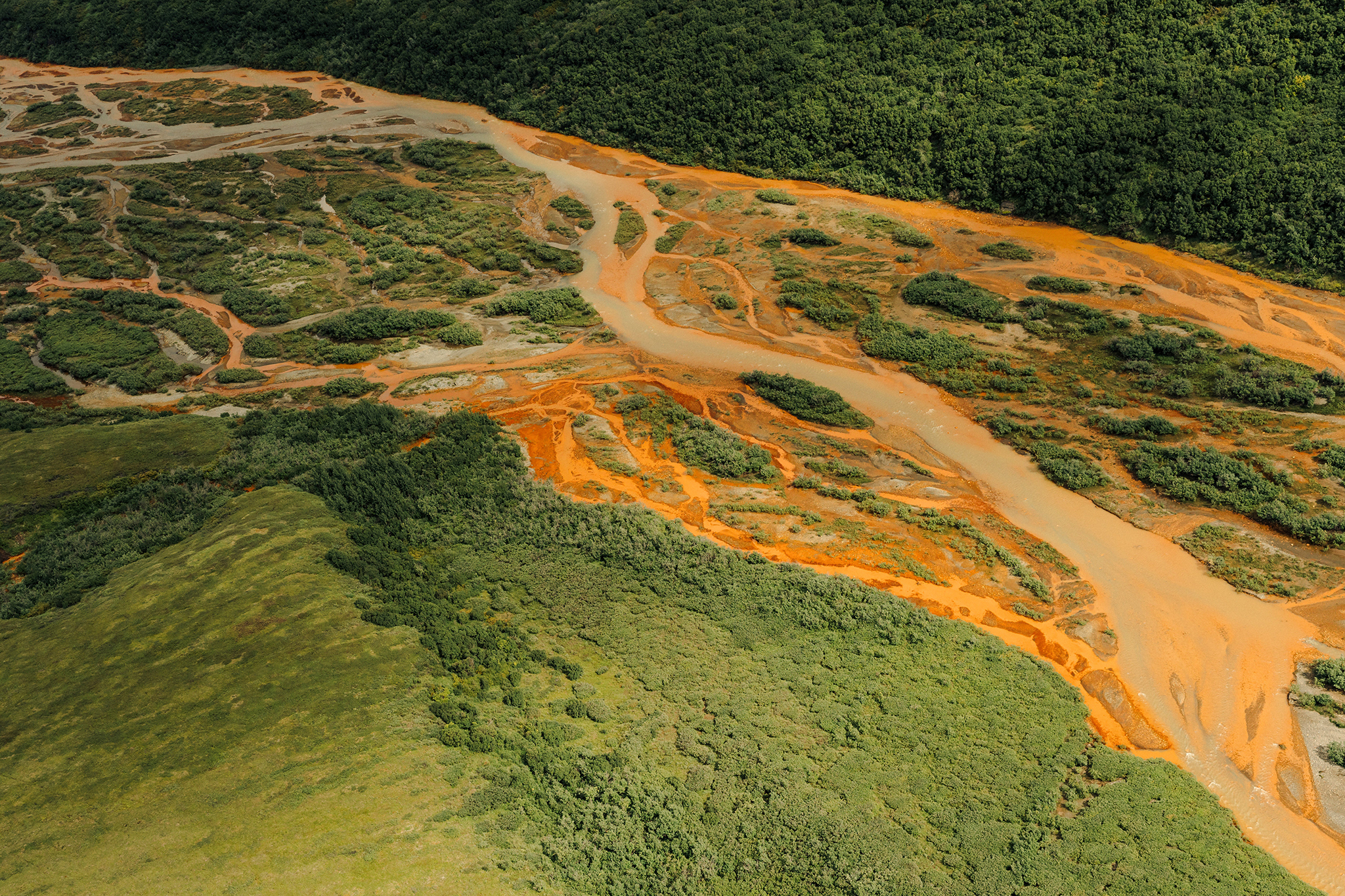 Once-pristine Arctic rivers are turning orange. Scientists are worried.