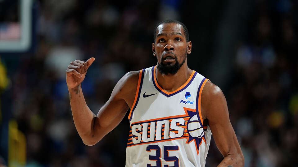 Phoenix Suns forward Kevin Durant (35) in the second half of an NBA basketball game Wednesday, March 27, 2024, in Denver.