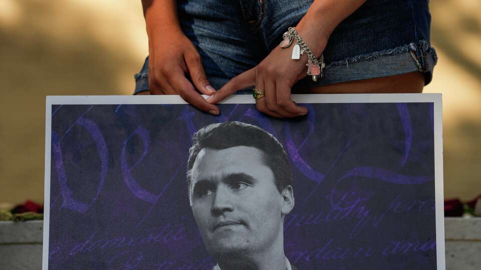 The University of Houston’s Turning Point USA chapter hosts a vigil in memory of Charlie Kirk, in front of the university’s Student Center and 9/11 memorial, on Thursday, Sept. 11, 2025 in Houston.