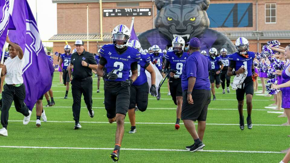 Ridge Point takes the field before the high school football game against Bridgeland at Hall Stadium in Missouri City, Thursday, Sept. 11, 2025.