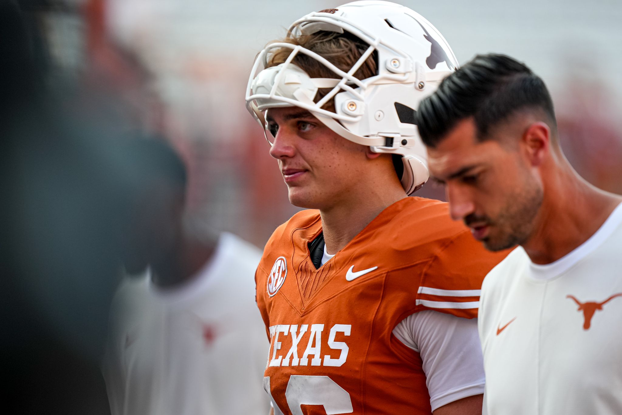 Arch Manning walking off field after loss