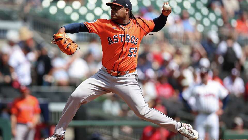 Houston Astros pitcher Framber Valdez (59) delivers in the first inning of a baseball game against the Atlanta Braves, Sunday, Sept. 14, 2025, in Atlanta. (AP Photo/Colin Hubbard)