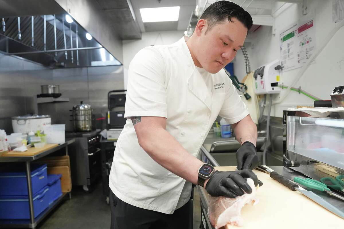 Kaisen owner and chef Sunny Bertsch filets a madai, one of the fish he has shipped in from Japan for his takeaway sushi restauarant in Houston on Thursday, Sept. 11, 2025. Bertsch has been dealing with increase costs of fish due to tariffs and climate change.