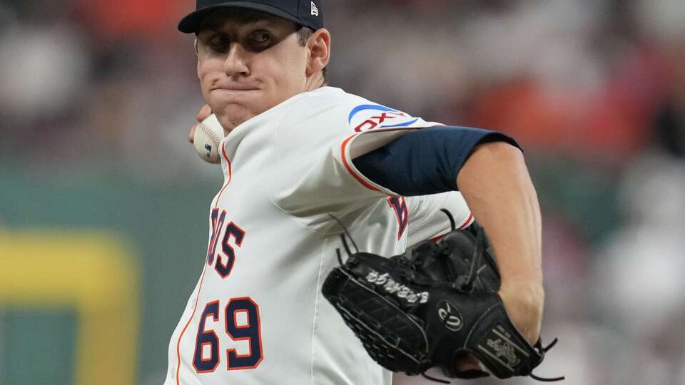 Houston Astros pitcher AJ Blubaugh (69) pitches in the third inning against the Texas Rangers at Daikin Park in Houston on Tuesday, Sept. 16, 2025.