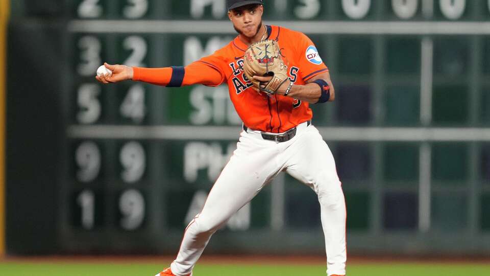 Houston Astros shortstop Jeremy Peña (3) throws out Seattle Mariners’ Dominic Canzone on a fielder’s choice during the second inning of a MLB baseball game in Houston, Friday, Sept. 19, 2025.
