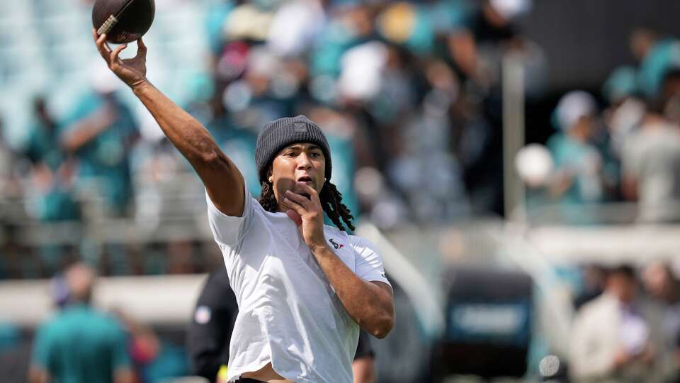 Houston Texans quarterback CJ. Stroud warms up before an NFL football game against the Jacksonville Jaguars at Everbank Stadium in Jacksonvillew, Fla., Sunday, Sept. 21, 2025.