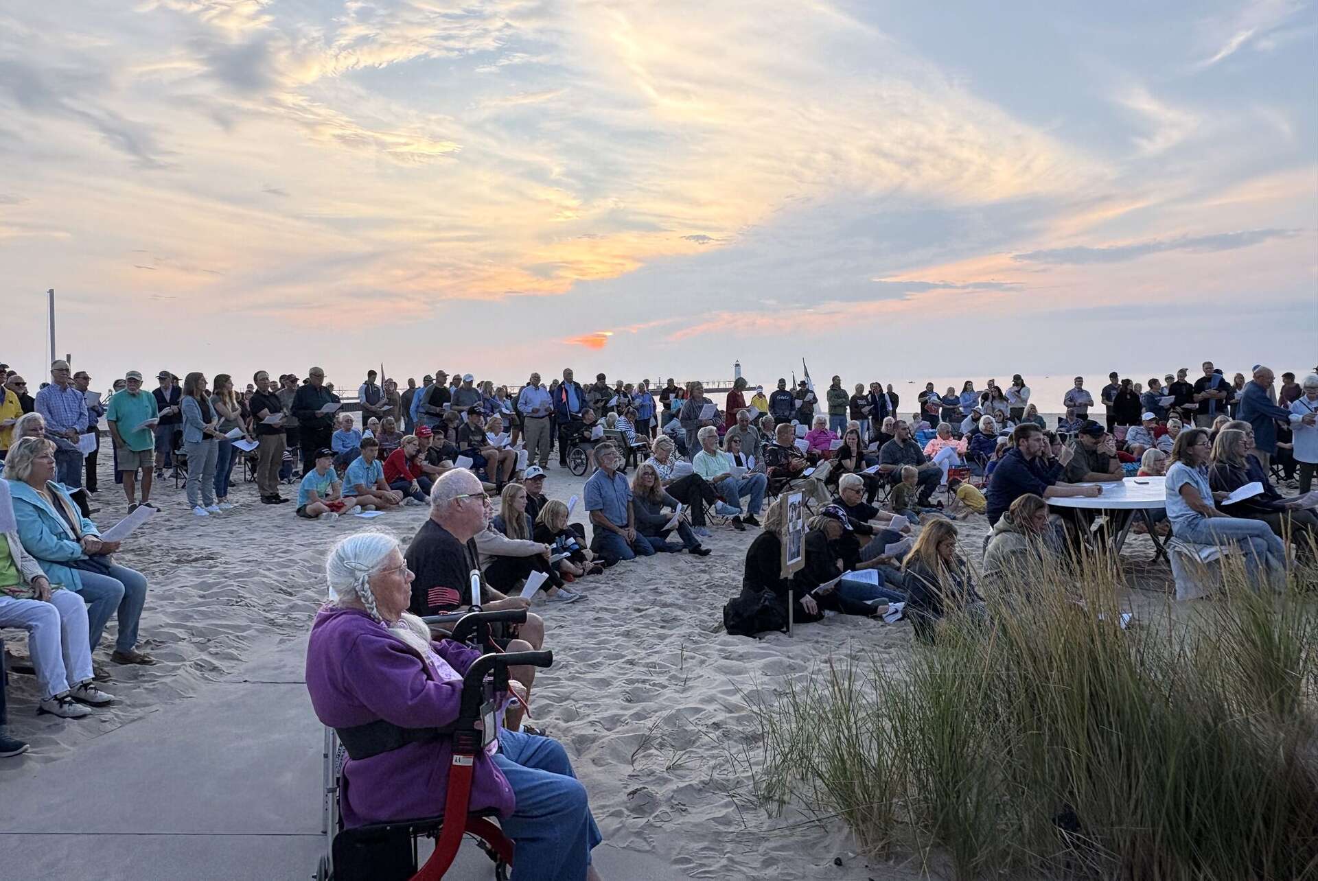 Charlie Kirk memorial event draws more than 200 to Manistee beach