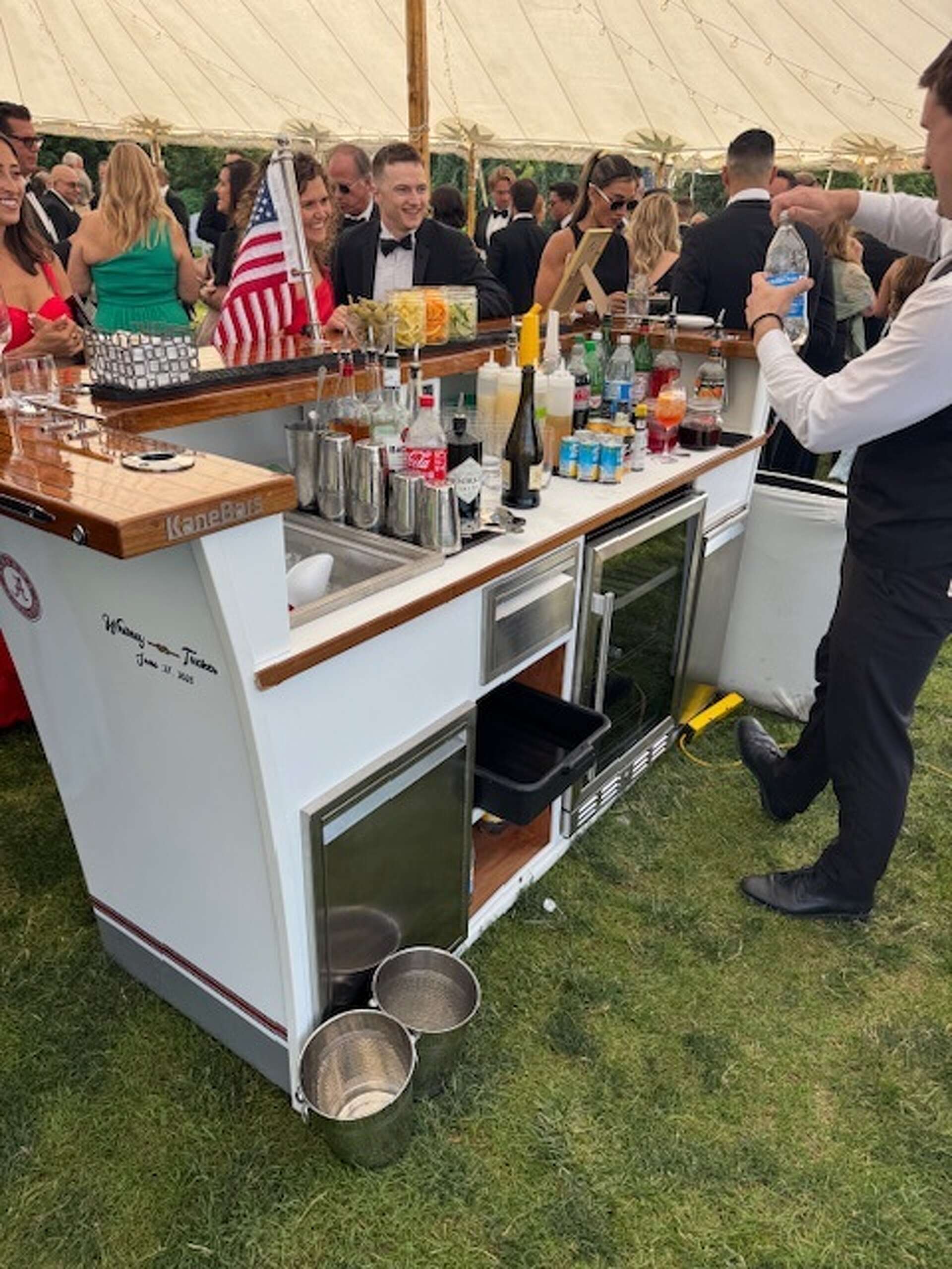 Stamford CEO creates custom bars modeled off boat sterns