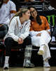 Texas Longhorns setter Ella Swindle (1) talks with Player Development Consultant Jessica Brannan while sitting on the bench with a boot during warm-ups ahead of Texas Volleyball game against the Vanderbilt Commodores at Gregory Gymnasium in Austin, Sept. 24, 2025.