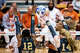 Texas Longhorns outside hitter Cari Spears (23) puts the ball over the net through Commodore defense in the second set against Vanderbilt at Gregory Gymnasium in Austin, Sept. 24, 2025.