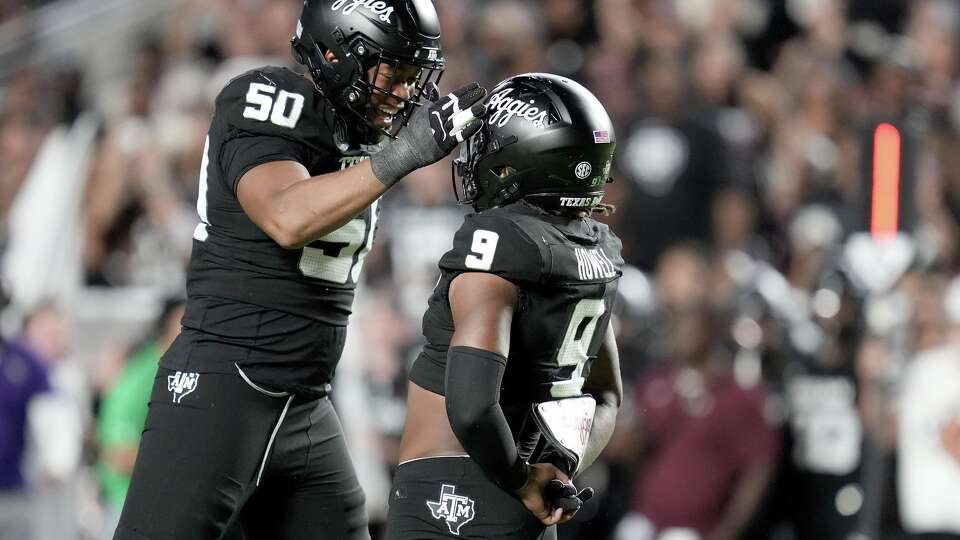 Texas A&M defensive end Cashius Howell (9) reacts with defensive end Dayon Hayes (50) after sacking Mississippi State quarterback Blake Shapen during the second quarter of an NCAA college football game Saturday, Oct. 4, 2025, in College Station, Texas. (AP Photo/Sam Craft)