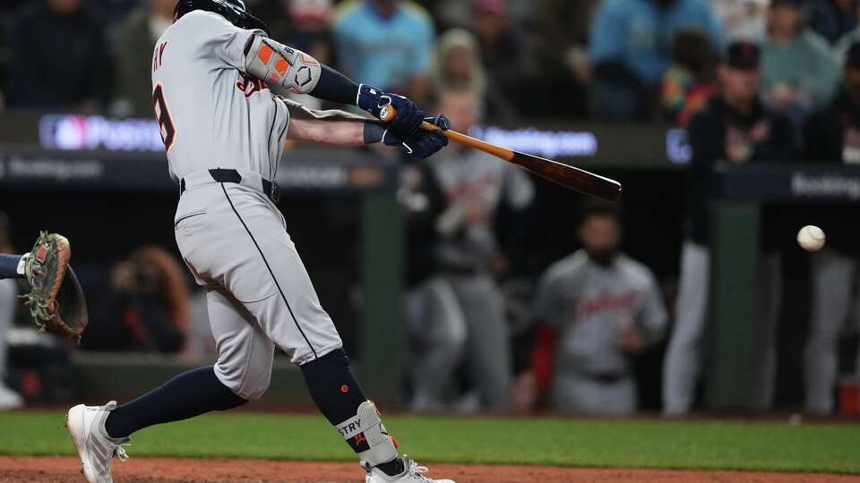Detroit Tigers' Zach McKinstry hits a single to score Spencer Torkelson for the go-ahead run during the 11th inning in Game 1 of baseball's American League Division Series against the Seattle Mariners, Saturday, Oct. 4, 2025, in Seattle.