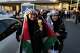 Protesters holding Palestinian flags in Istanbul