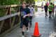 A boy runs on a bridge during Big Rapids Middle School's Foam Frenzy at Hemlock Park, Friday, Oct. 3. The Parent Teacher Organization event raised funds for student activities.
