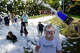 A foam-covered boy poses for a photo as other students are covered with more foam during Big Rapids Middle School's Foam Frenzy at Hemlock Park, Friday, Oct. 3. The Parent Teacher Organization event raised funds for student activities.