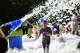 A foam-covered boy walks away from two foam-blasters during Big Rapids Middle School's Foam Frenzy at Hemlock Park, Friday, Oct. 3. The Parent Teacher Organization event raised funds for student activities.