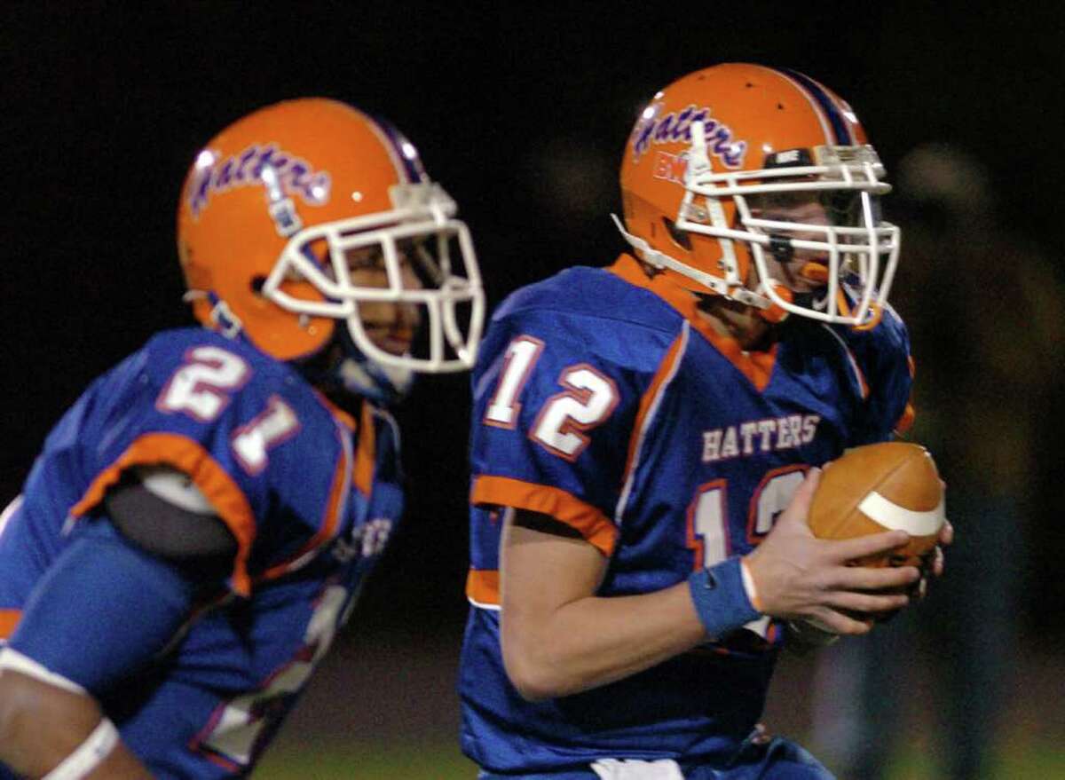 Danbury's 12, Nick Hammed sets up for a pass during the football game against Ridgefield at Danbury High School Nov. 24, 2010.