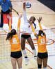 Texas Longhorns outside hitter Torrey Stafford (4) hits the ball over the Tennessee defense in the fourth set as the Texas Longhorns take on the Tennessee Lady Volunteers at home in Austin, Oct. 8, 2025.
