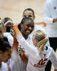 Texas Longhorns defensive specialist Callie Krueger (12) embraces outside hitter Torrey Stafford (4) during a time out in the second set as the Texas Longhorns take on the Tennessee Lady Volunteers at home in Austin, Oct. 8, 2025.